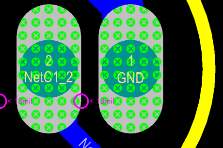 These pads are closer than the 13mil specified in the Clearance Constraint design rule.